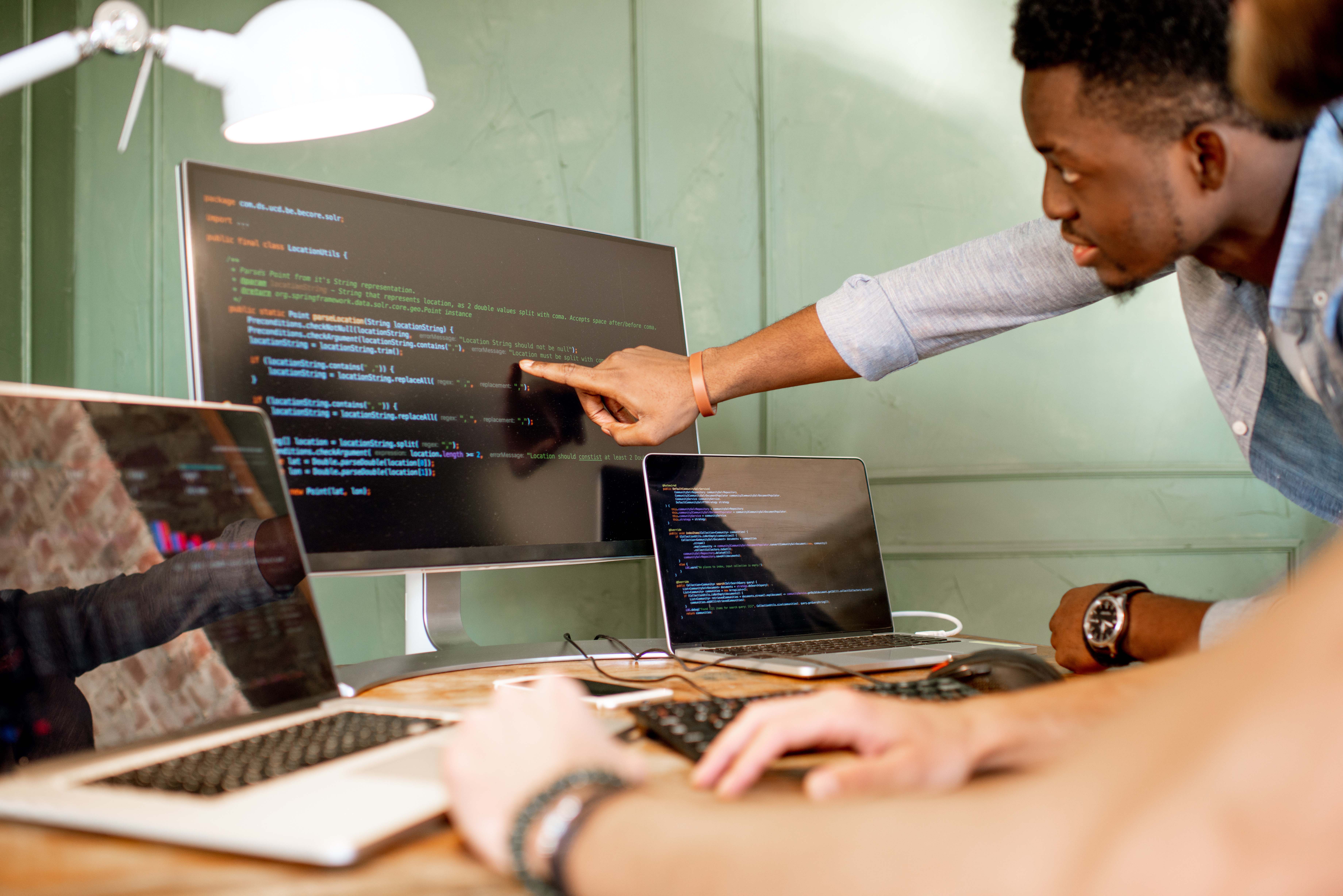 Programmers working with program code